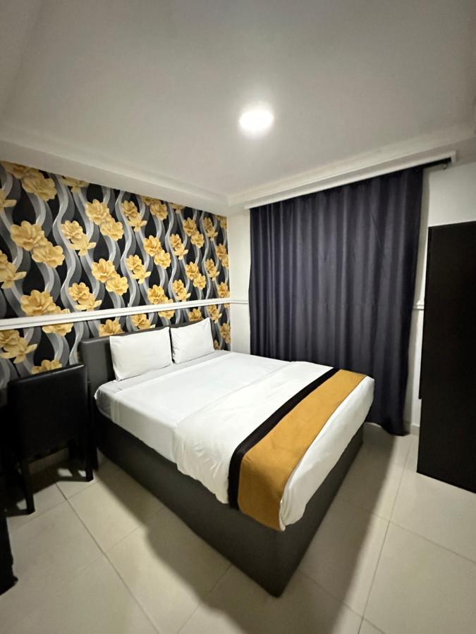 Msquare Hotel Gra อีเคจา ภายนอก รูปภาพ